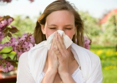 Woman sneezing